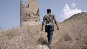 Should I Stay or Should I Go - Amantea, Calabria, Italy - Stanley climbing the hill to old castle